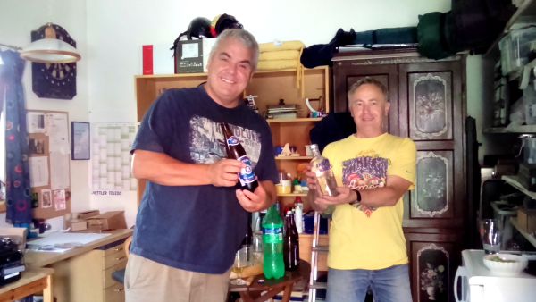 Jon and Othmar carefully checking out the beer and schnapps supplies.